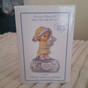 Precious Moments Musical Figurine “You Are My Sunshine” Girl in Raincoat 2010